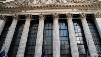 American flags fly on the front of the New York Stock Exchange building, Oct. 7, 2020, in New York City.