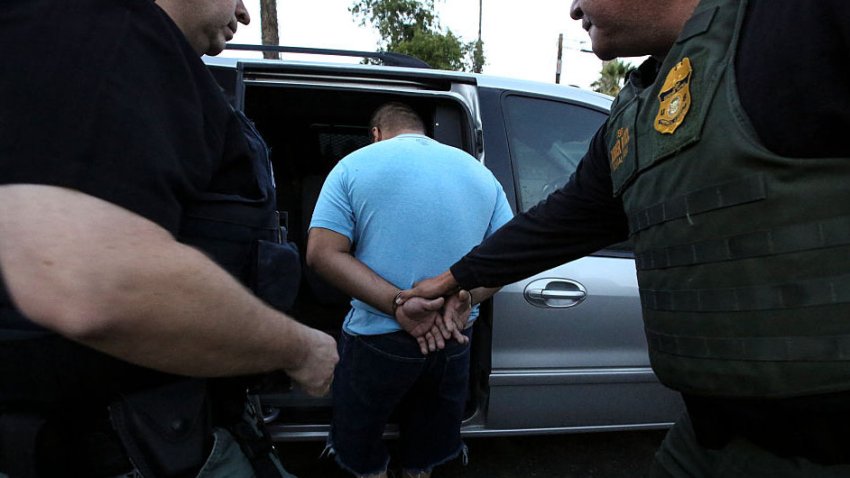 RIVERSIDE, CA – AUGUST 12: ICE Enforcement and Removal Operations unit apprehends Hugo Medina, 32, in a morning raid from his residence in Riverside. Immigration and Customs Enforcement officials say they are relying more than ever on costly manhunts to locate immigrants in the country illegally who have criminal records. In the past, the agency would simply contact local jails where such immigrants were being detained and ask jail officials to hold them until an ICE van could pick them up, but hundreds of counties across the country stopped honoring such requests after a federal judge last year found that practice unconstitutional. (Irfan Khan/Los Angeles Times via Getty Images)