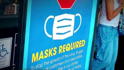 Negocios comienzan a implementar uso de mascarillas tras anuncio del CDC