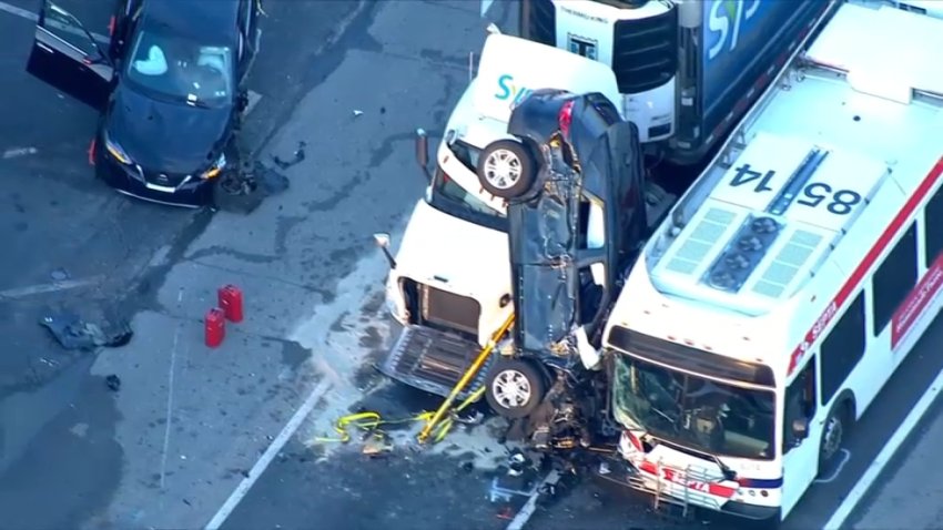 Vehicle wedged between a truck and a SEPTA bus