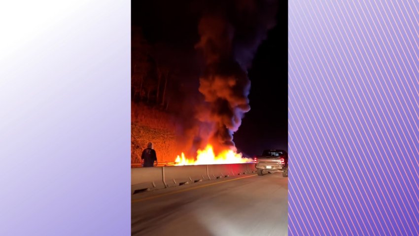 a fiery plane crash on a highway