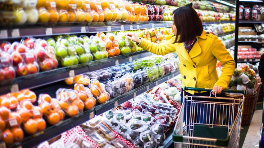 Young woman shopping in the supermarket