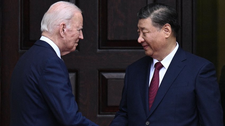 TOPSHOT – US President Joe Biden greets Chinese President Xi Jinping before a meeting during the Asia-Pacific Economic Cooperation (APEC) Leaders’ week in Woodside, California on November 15, 2023. Biden and Xi will try to prevent the superpowers’ rivalry spilling into conflict when they meet for the first time in a year at a high-stakes summit in San Francisco on Wednesday. With tensions soaring over issues including Taiwan, sanctions and trade, the leaders of the world’s largest economies are expected to hold at least three hours of talks at the Filoli country estate on the city’s outskirts. (Photo by Brendan SMIALOWSKI / AFP) (Photo by BRENDAN SMIALOWSKI/AFP via Getty Images)