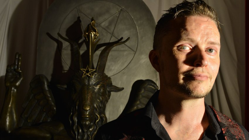 SALEM, MA – JULY 25: Lucien Greaves, spokesman for The Satanic Temple, with a statue of Baphomet at the group’s meeting house in Salem, MA. The Satanic Temple, a group of political activists who identify themselves as a religious sect, are seeking to establish After-School Satan clubs as a counterpart to fundamentalist Christian Good News Clubs, which they see as the Religious Right to infiltrate  public education, and erode the separation of church and state. (Photo by Josh Reynolds for The Washington Post via Getty Images)