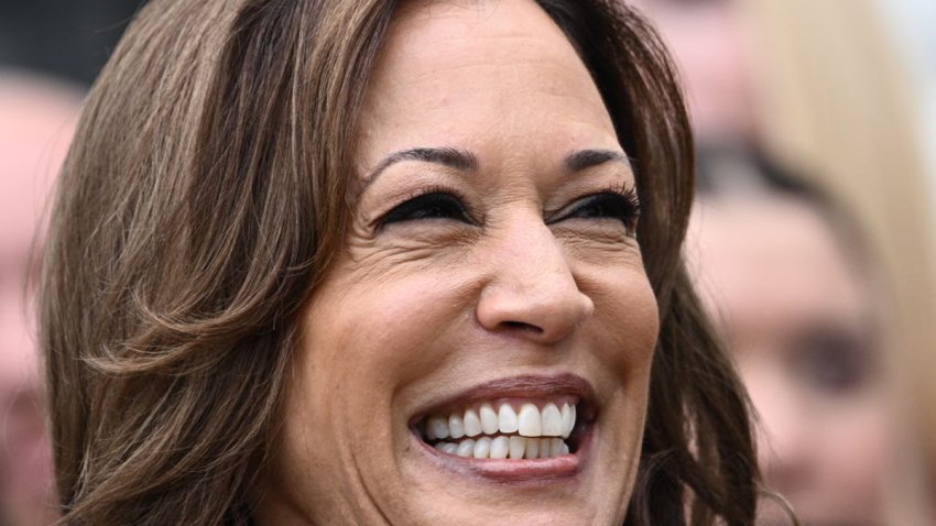 US Vice President Kamala Harris smiles before speaking during an event honoring National Collegiate Athletic Association (NCAA) championshiop teams from the 2023-2024 season, on the South Lawn of the White House in Washington, DC on July 22, 2024. Joe Biden on July 21, 2024 dropped out of the US presidential election and endorsed Vice President Kamala Harris as the Democratic Party’s new nominee, in a stunning move that upends an already extraordinary 2024 race for the White House. Biden, 81, said he was acting in the “best interest of my party and the country” by bowing to weeks of pressure after a disastrous June debate against Donald Trump stoked worries about his age and mental fitness. (Photo by Brendan SMIALOWSKI / AFP) (Photo by BRENDAN SMIALOWSKI/AFP via Getty Images)