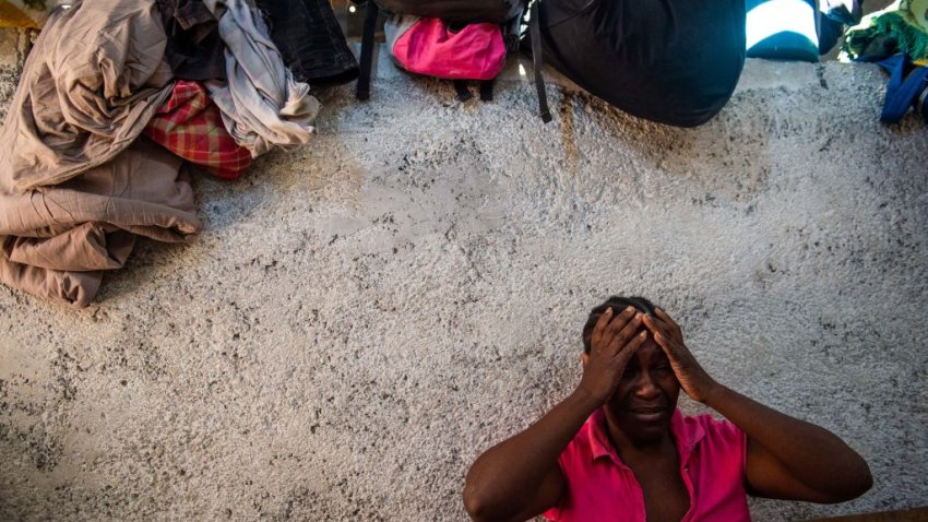 Displaced families who have fled their homes in neighborhoods facing armed gang violence take refuge in the Frere Jean Baptiste college in Port-au-Prince, Haiti, October 31, 2024. It is estimated that over 4,000 people have been killed or injured in gang-related violence this year alone. According to the International Organization for Migration (IOM), over 160,000 people are currently displaced in the capital’s metropolitan area. (Photo by Clarens SIFFROY / AFP) (Photo by CLARENS SIFFROY/AFP via Getty Images)