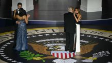 CORRECTION / US President Donald Trump and First Lady Melania Trump next to Vice President J.D. Vance and his wife Usha Vance dance during the Starlight inaugural ball at the Walter E. Washington Convention Center in Washington, DC, on January 20, 2025. (Photo by Jim WATSON / AFP) / "The erroneous mention[s] appearing in the metadata of this photo by Jim WATSON has been modified in AFP systems in the following manner: [Starlight] instead of [Liberty]. Please immediately remove the erroneous mention[s] from all your online services and delete it (them) from your servers. If you have been authorized by AFP to distribute it (them) to third parties, please ensure that the same actions are carried out by them. Failure to promptly comply with these instructions will entail liability on your part for any continued or post notification usage. Therefore we thank you very much for all your attention and prompt action. We are sorry for the inconvenience this notification may cause and remain at your disposal for any further information you may require." (Photo by JIM WATSON/AFP via Getty Images)