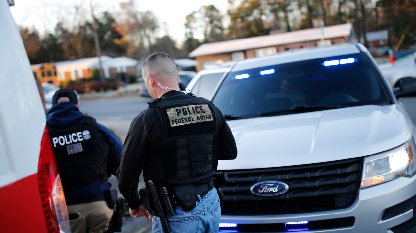 CHARLOTTE, NC – January 8: Immigration and Customs Enforcement agents work a traffic stop to detain an undocumented immigrant with a criminal record after an early morning stakeout, Wednesday, January 8, 2020. While agents in the Charlotte Field Office are in charge of thousands of cases at a time, ICE and the Mecklenburg County Sheriff have quarreled over the sheriff’s refusal to follow ICE detainers. (Photo by Eamon Queeney/For The Washington Post via Getty Images)