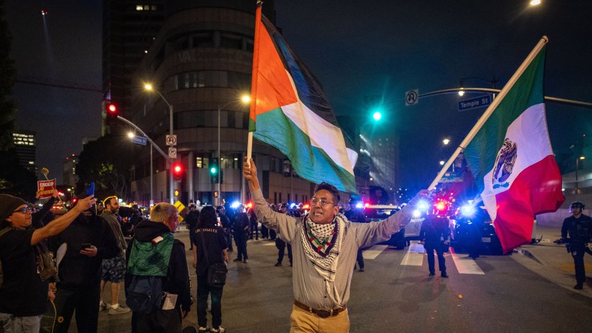 3Los Angeles, CA – June 06: Demonstrators protest outside the Metropolitan Detention Center in response to ICE raids in Los Angeles on Friday, June 6, 2025 in Los Angeles, CA. (Jason Armond / Los Angeles Times via Getty Images)