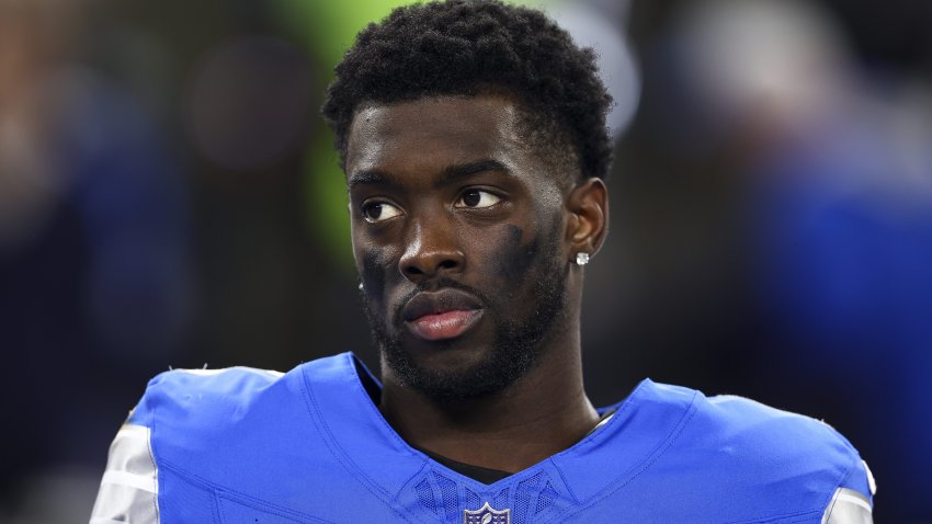 Terrion Arnold #0 of the Detroit Lions stands on the sidelines.
