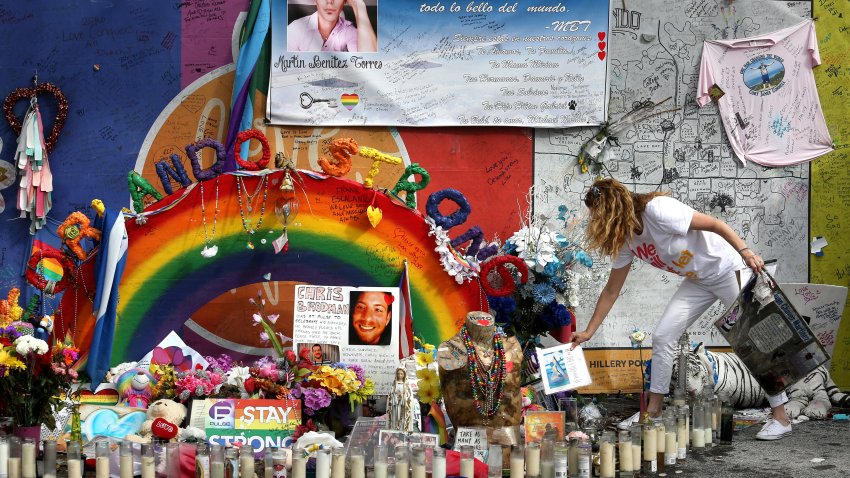 Pulse nightclub owner Barbara Poma tends to the memorial in front of her club Saturday, June 10, 2017, in Orlando, Florida. Poma in April left the onePULSE Foundation, a nonprofit she created to build a permanent memorial to the 2016 mass shooting at the nightclub. (Joe Burbank/Orlando Sentinel/Tribune News Service via Getty Images)